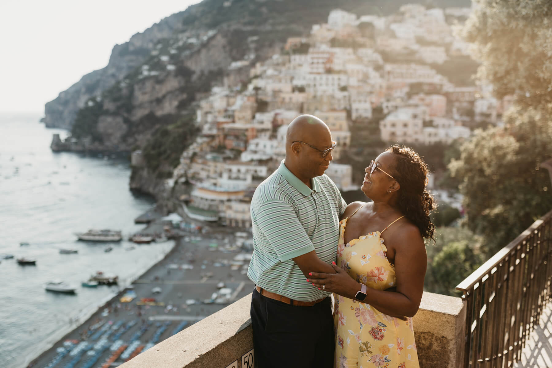 A couple hugging on the Amalfi Coast on a couple photoshoot with Flytographer